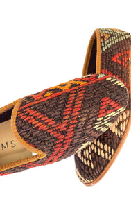 Pair of patterned shoes with a geometric design