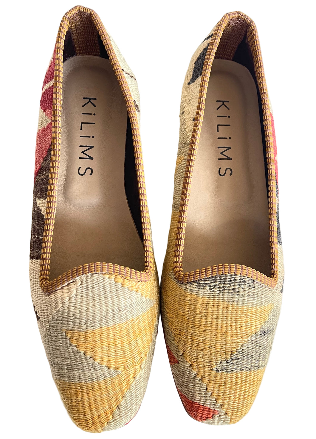 Pair of Kilims shoes with geometric pattern in soft yellow and beige